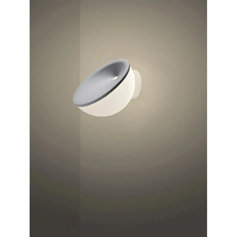 Track lighting with a brushed nickel finishBeep Wall Sconce